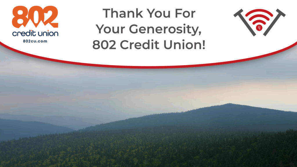 A Vermont Mountainscape featuring 802 Credit Union and Technology for Tomorrow's Logo